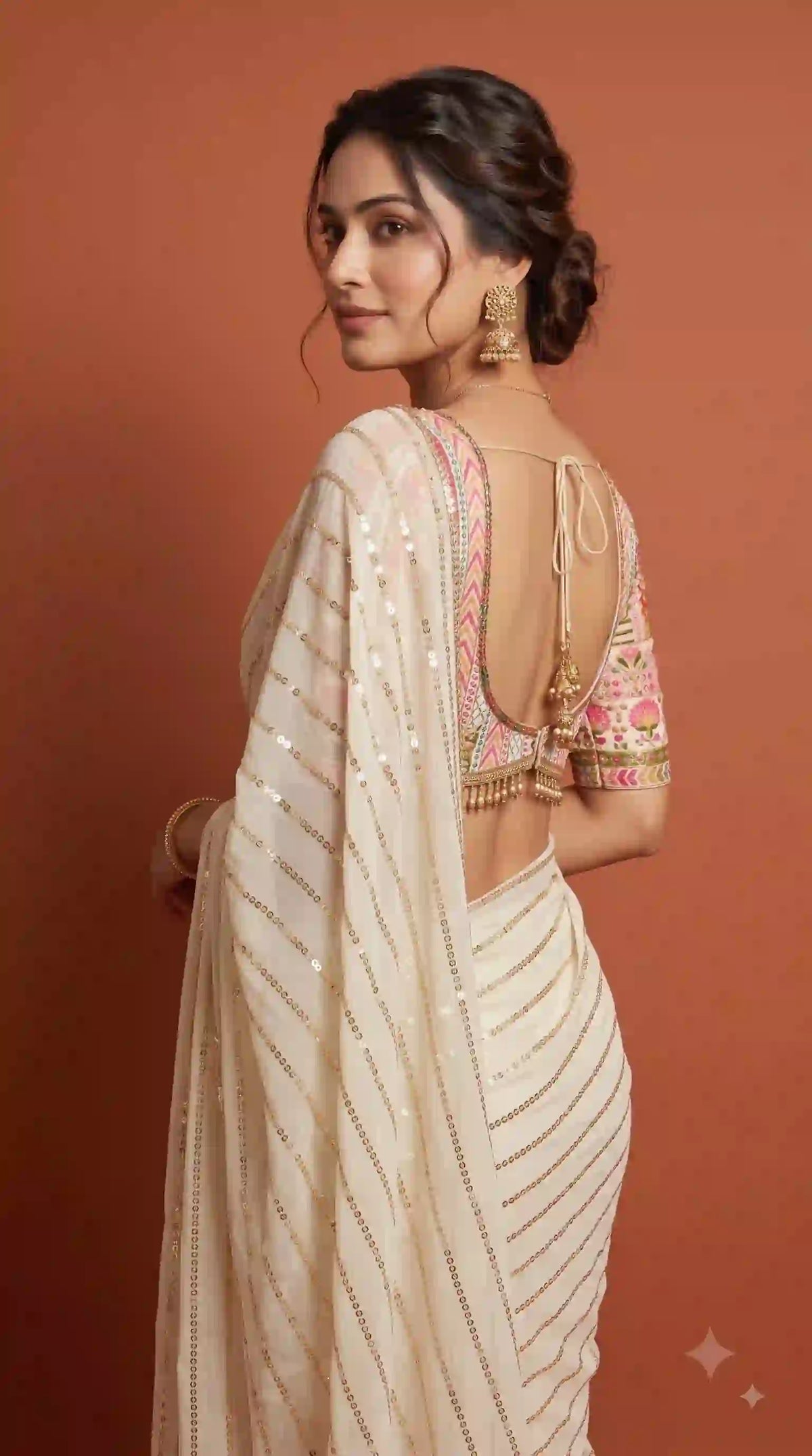 Cream georgette saree – side view with tassel blouse