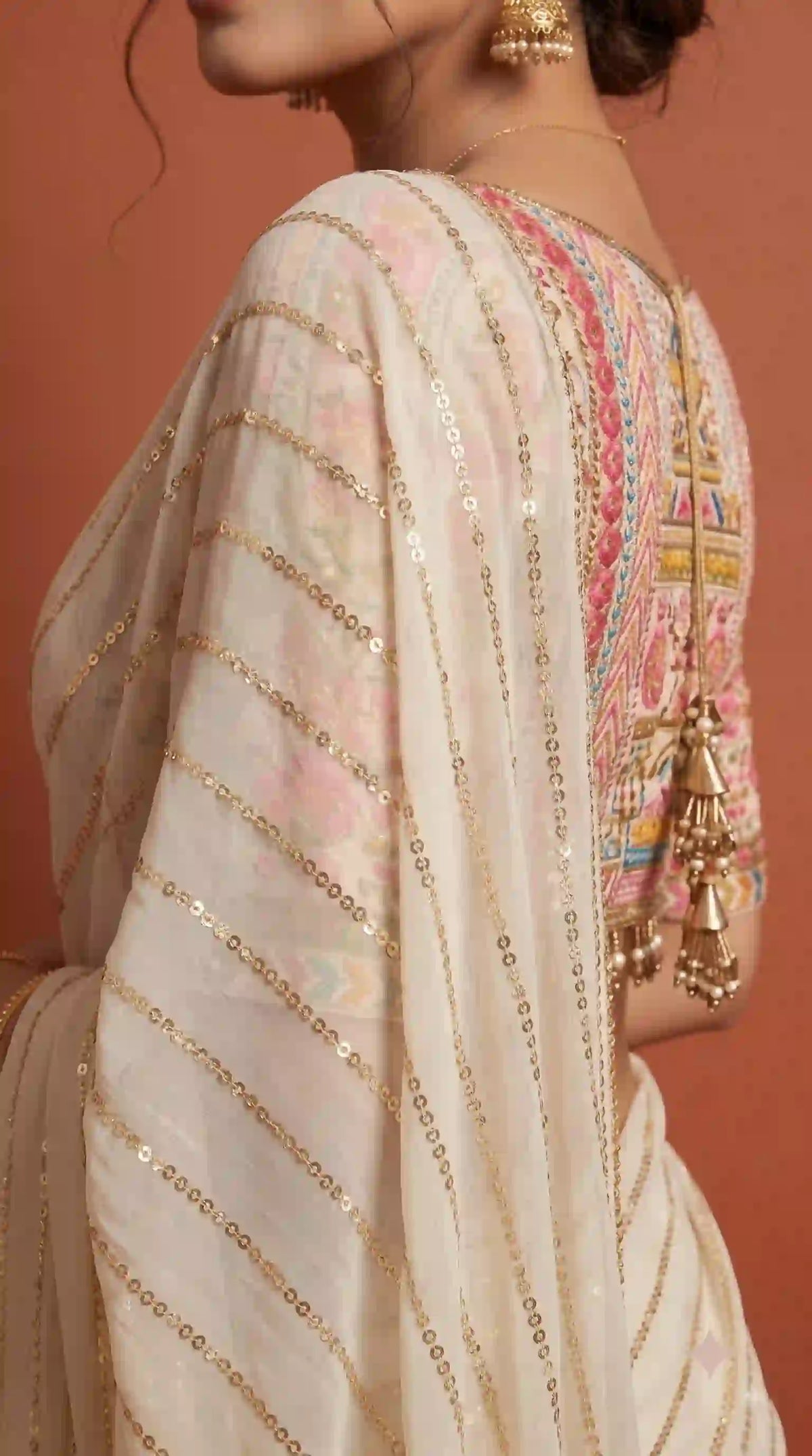 Sequin work and lace on cream georgette saree – close-up