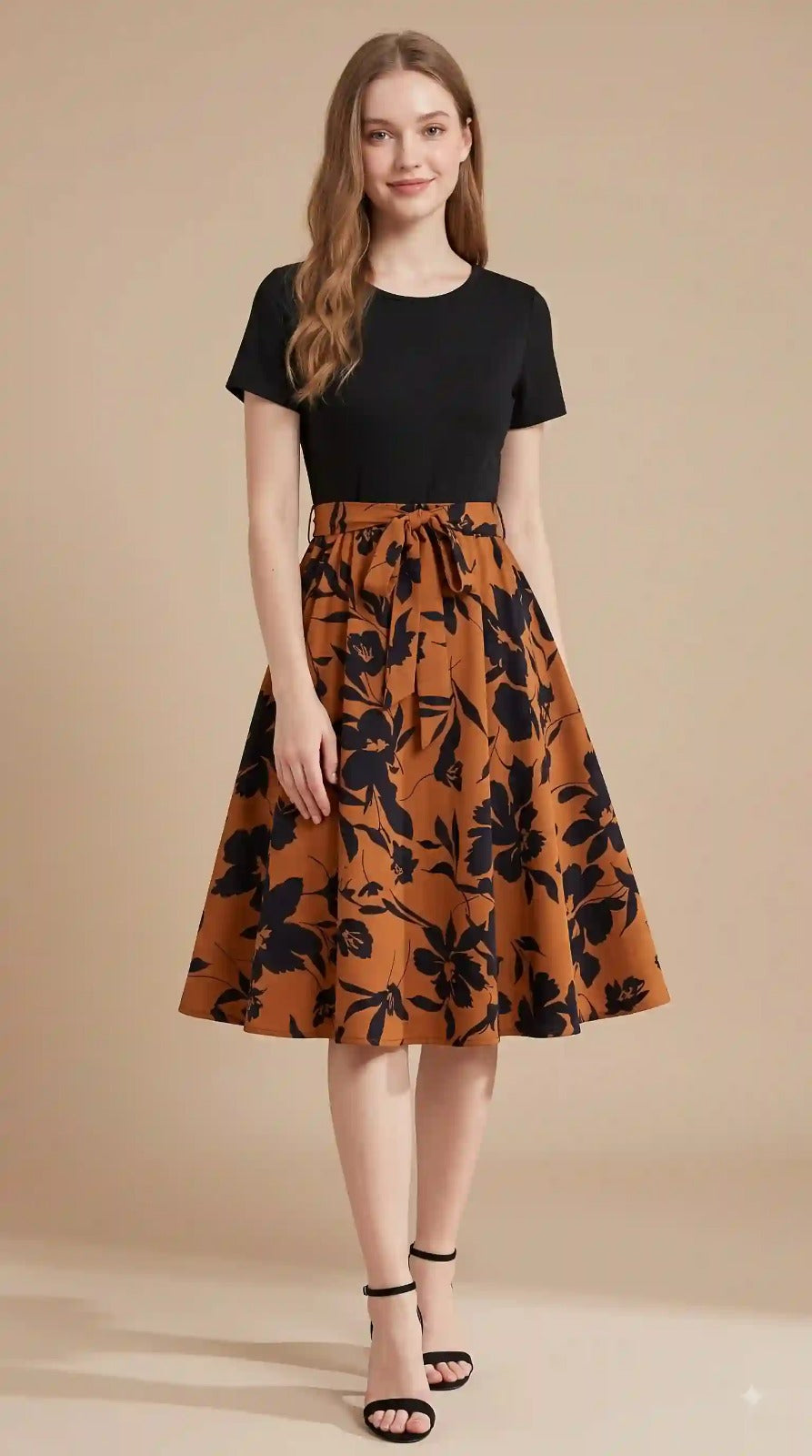Black top and rust floral A-line skirt midi dress with tie belt – front view