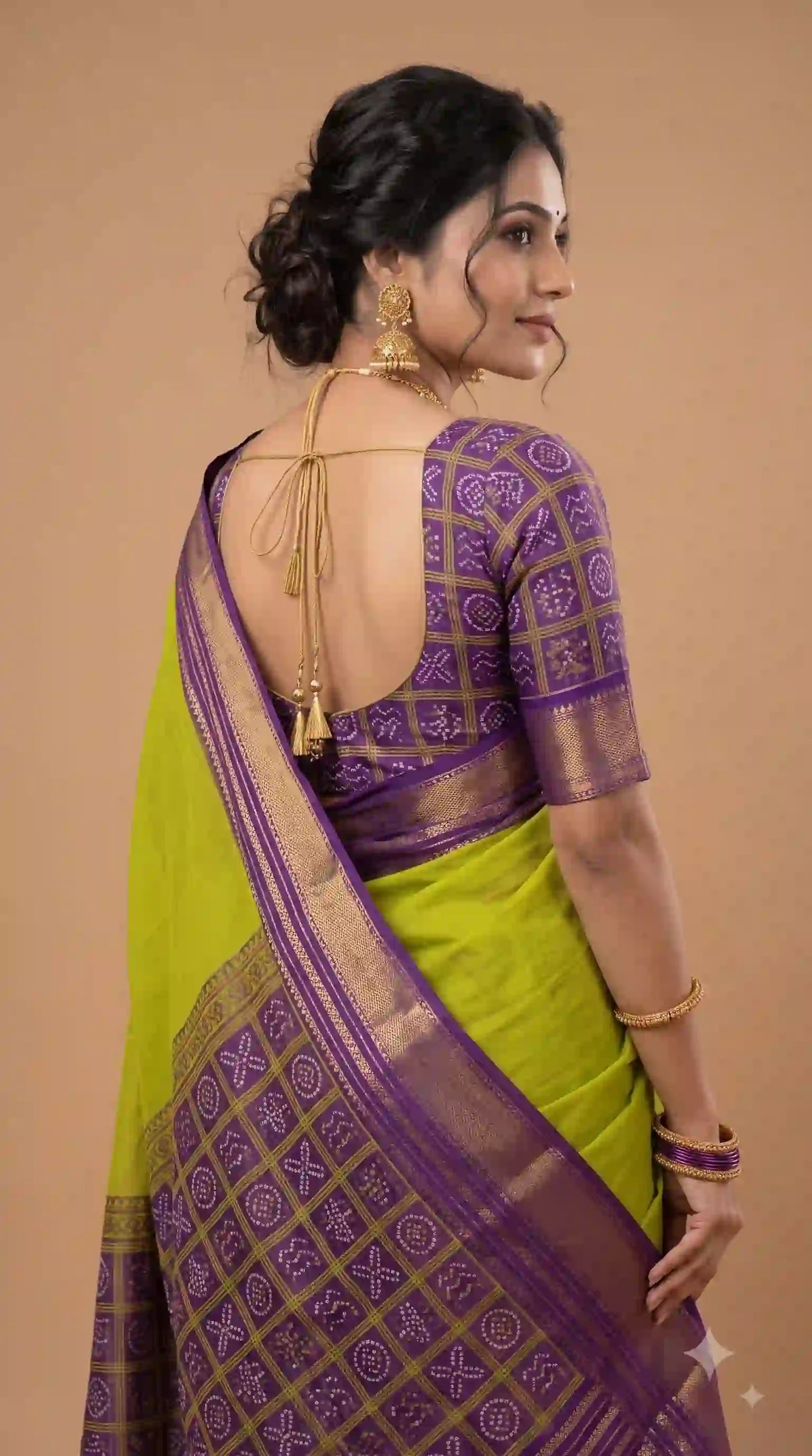 Parrot green Mysore silk saree with purple border – back view