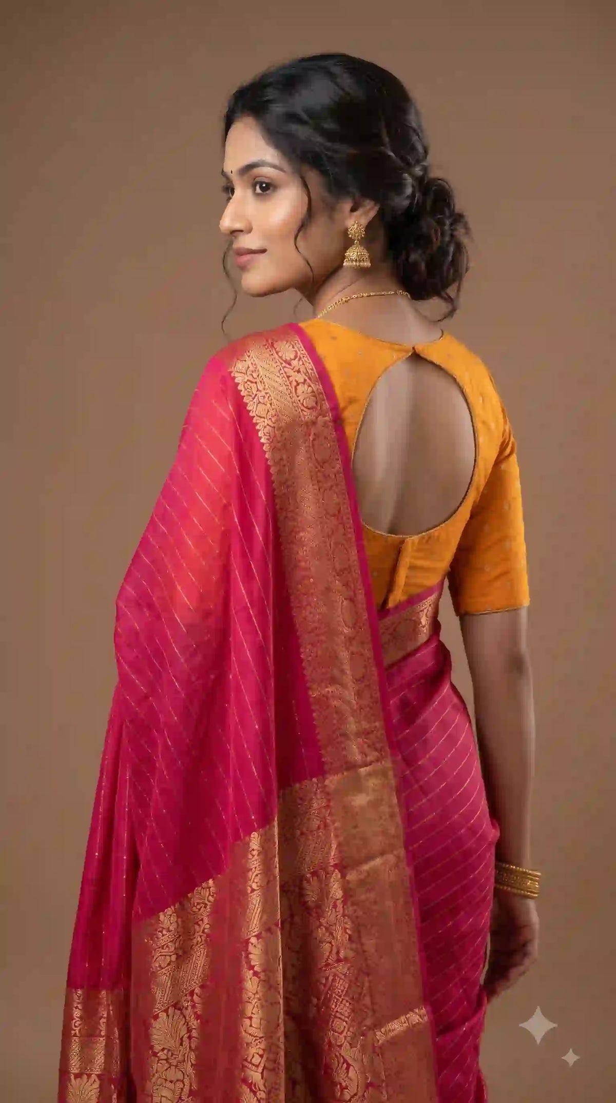 Rani pink Dola silk saree – back view with contrast blouse