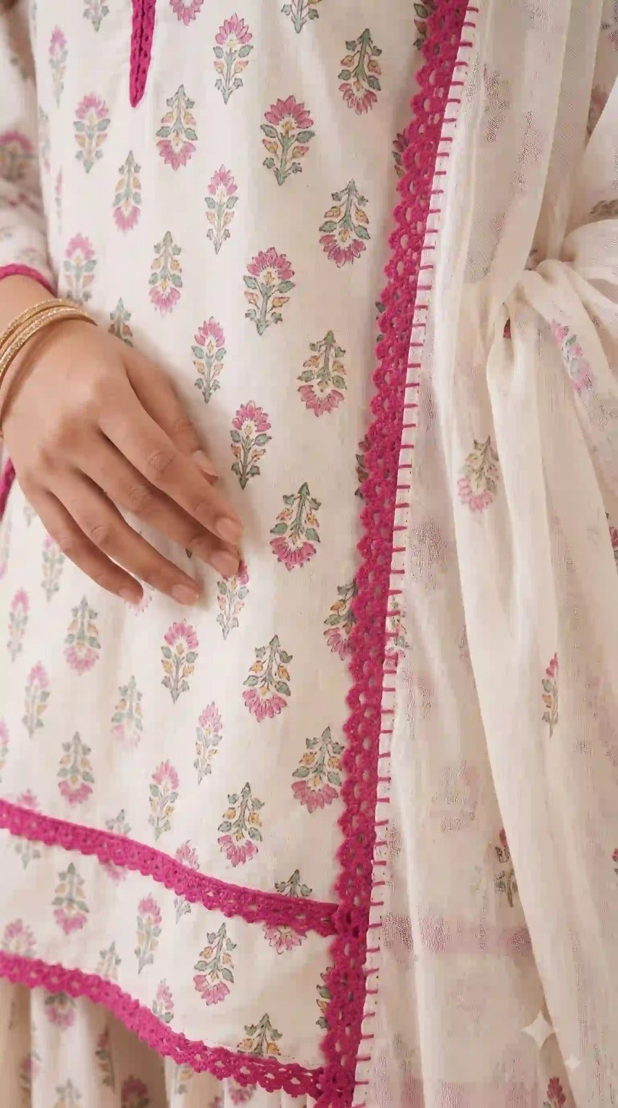 Pink lace hem and floral print – close-up