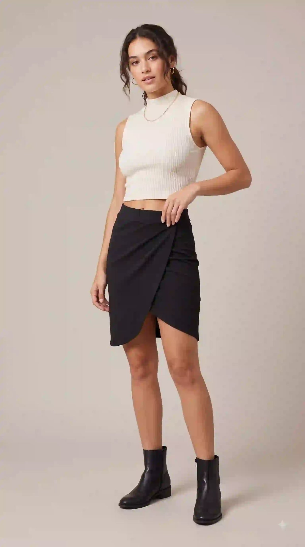 Black wrap-style mini skirt – full-length front view | TIGIQ